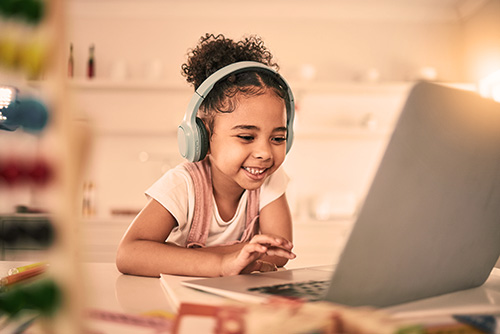 Girl on computer - Precision Educational Diagnostics